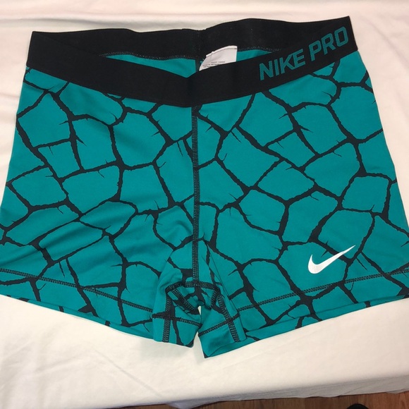 teal nike pros